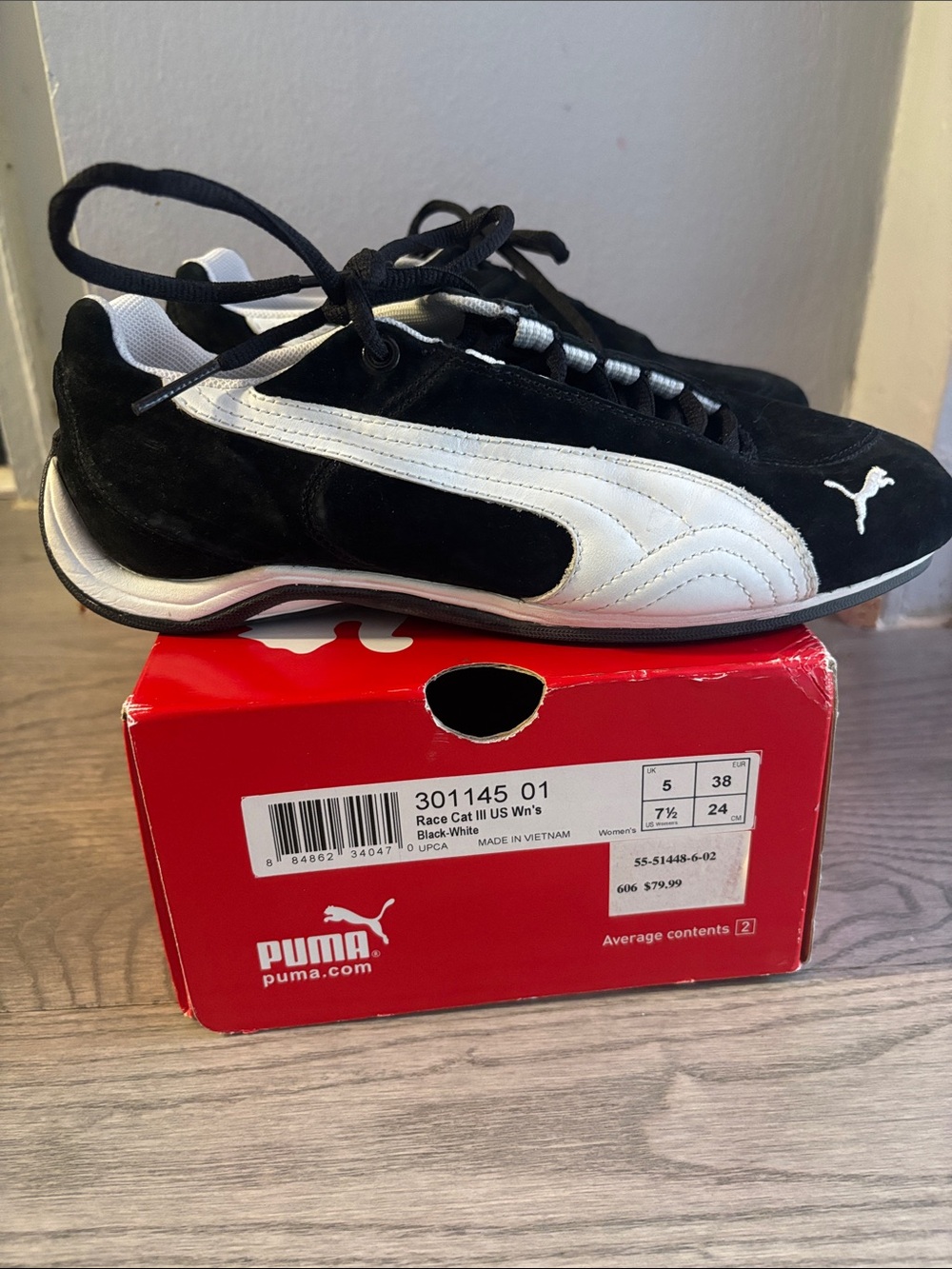 Puma Black and White Women’s Racing-Inspired Sneakers
